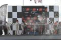 Champagne chaos on the podium (photo by Marc Waller)